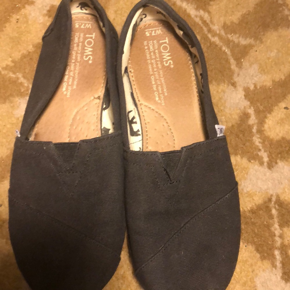 Toms classic black slip one size 7.5 worn once